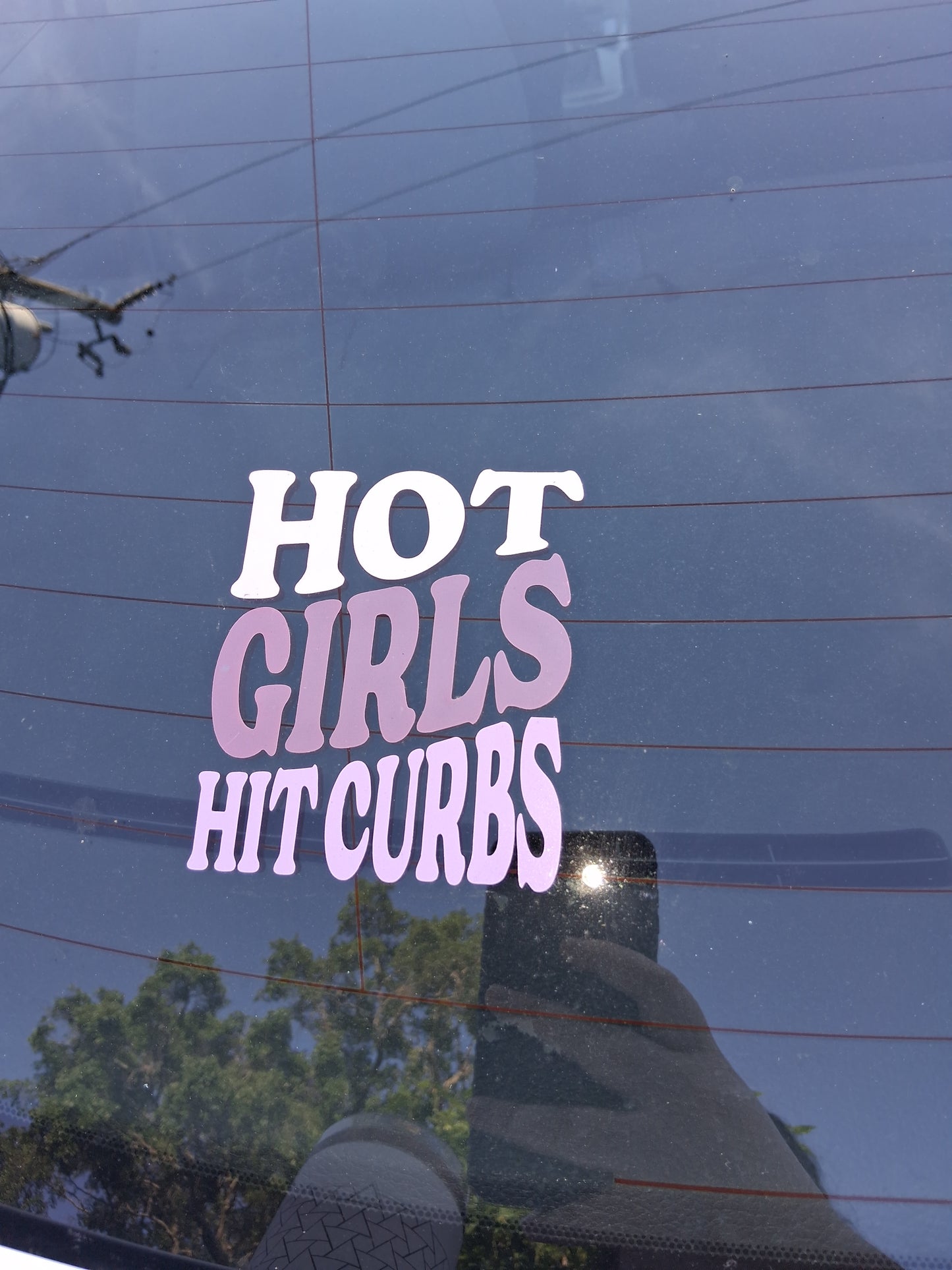 “Hot girls hit curbs” car decal